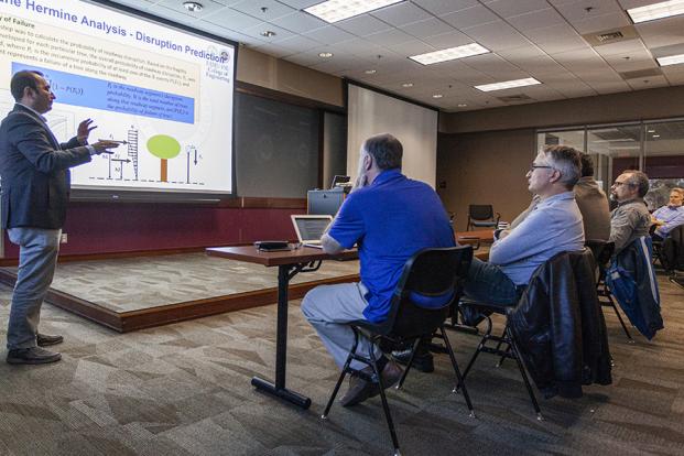 Dr. Ozguven speaks to group 