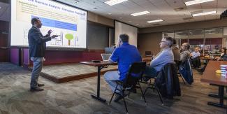 Dr. Ozguven speaks to group 