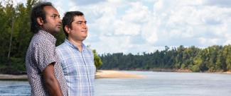 Dr. Ebrahem Ahmadisharaf and PhD student photographed on the bank of the Apalachicola River